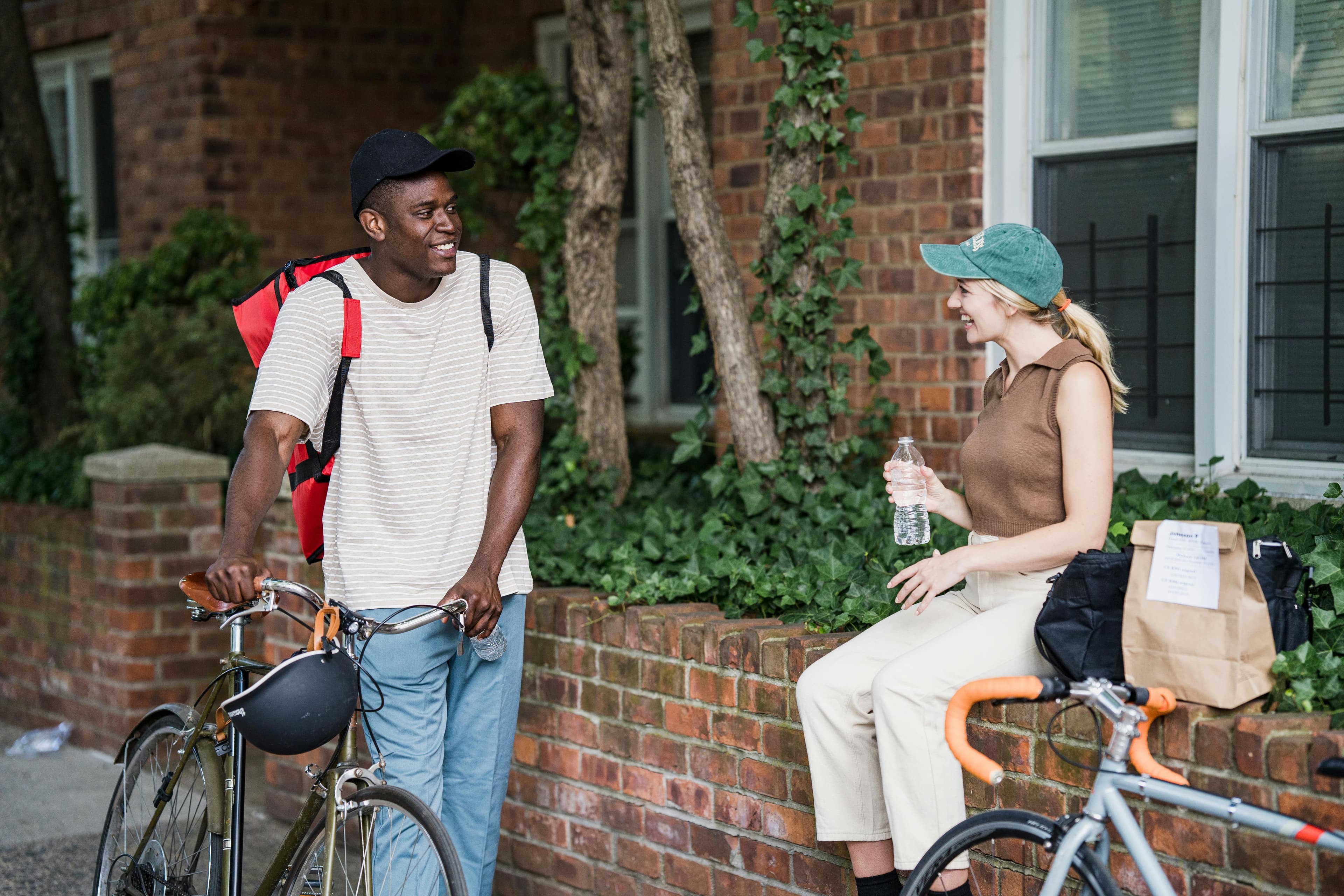 Two cyclists talking