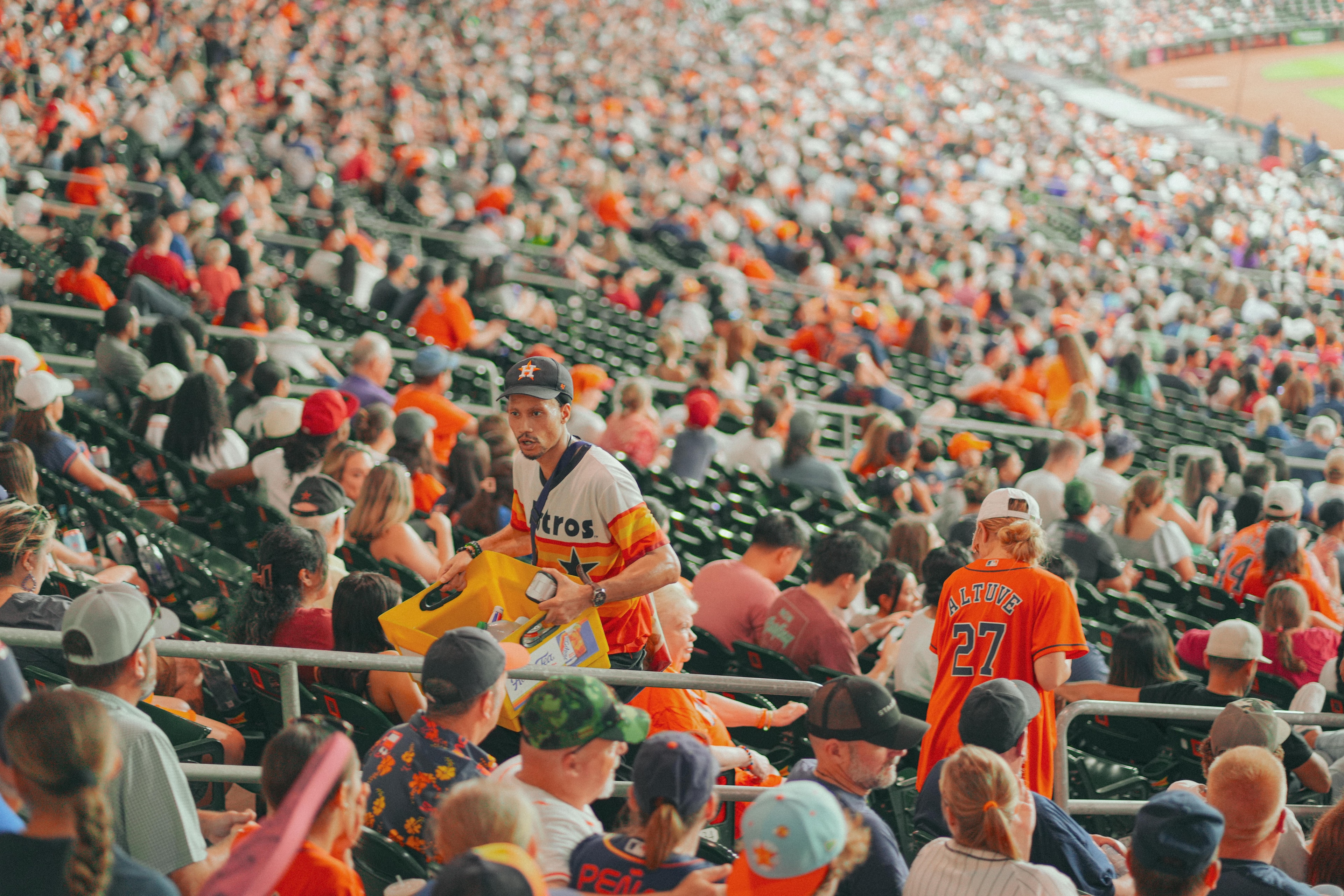 A crowd of fans at a sporting event