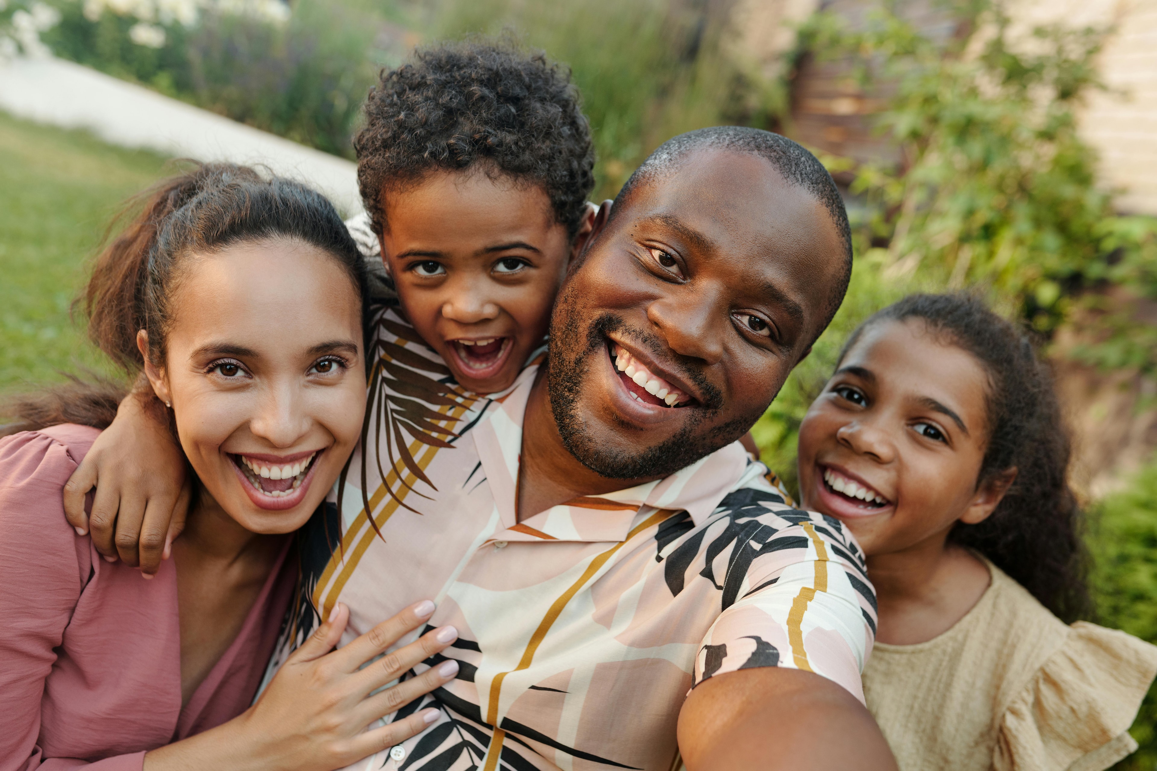 A family posing for a selfie