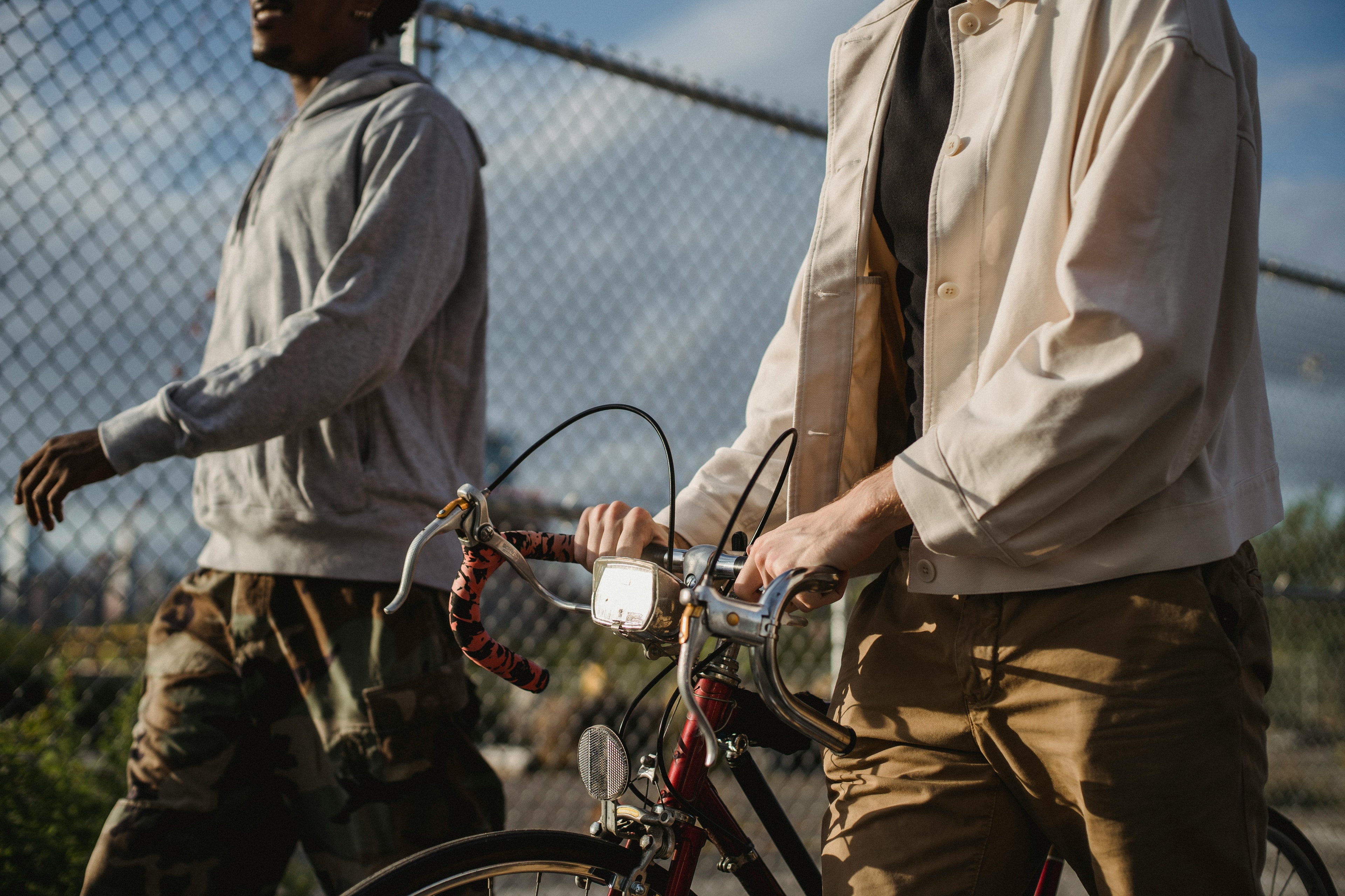 Two people biking together