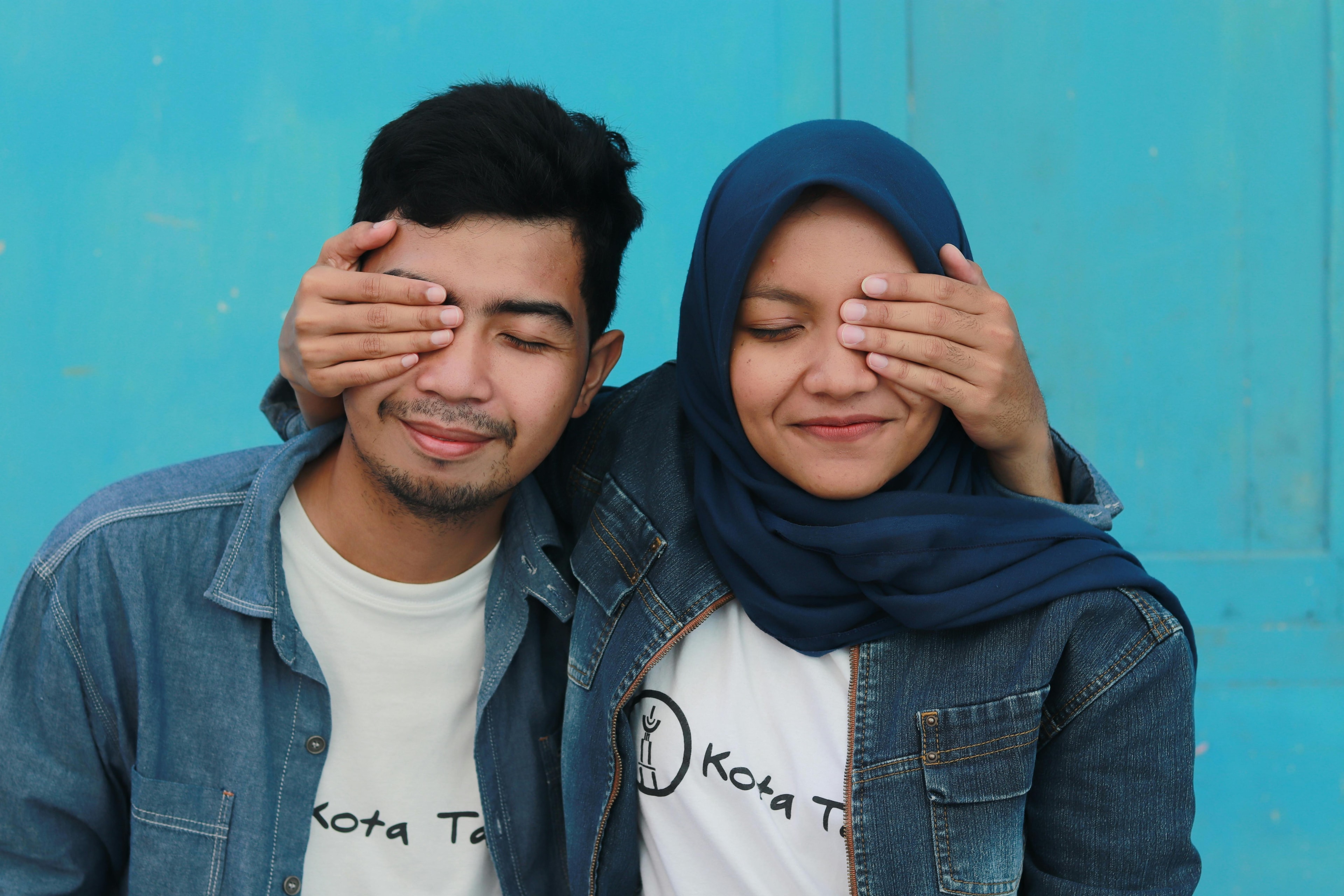 A man and woman pose for a picture